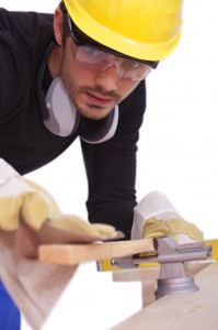 carpenter working with sandpaper